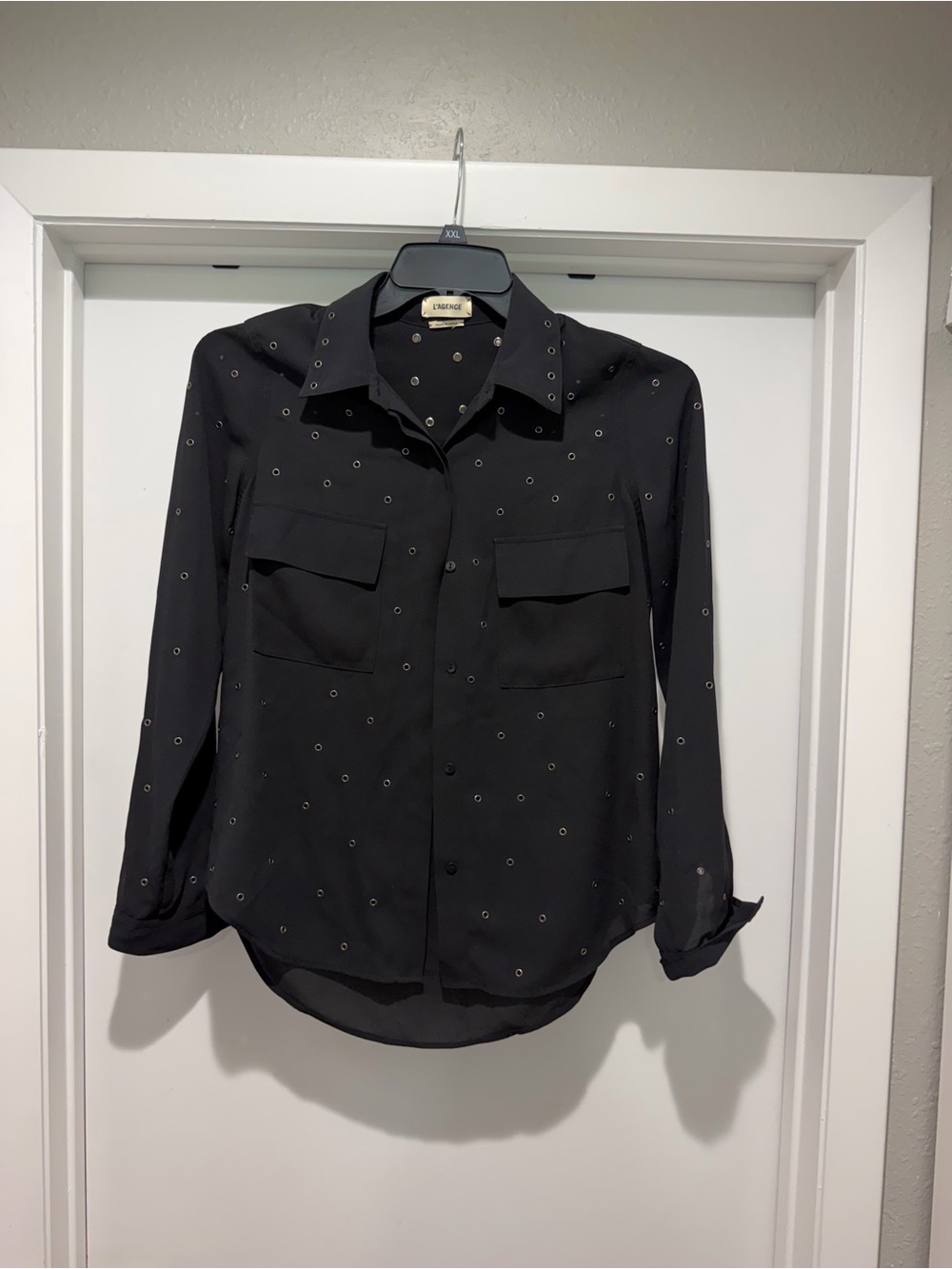 L’Agence Bruno grommet-embellished black button-down blouse